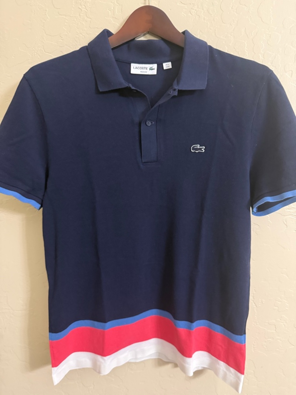 Lacoste Navy Polo with Red, White & Blue Hem